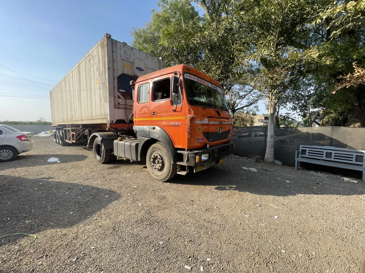 Refrigerated export container on a truck departing for the port